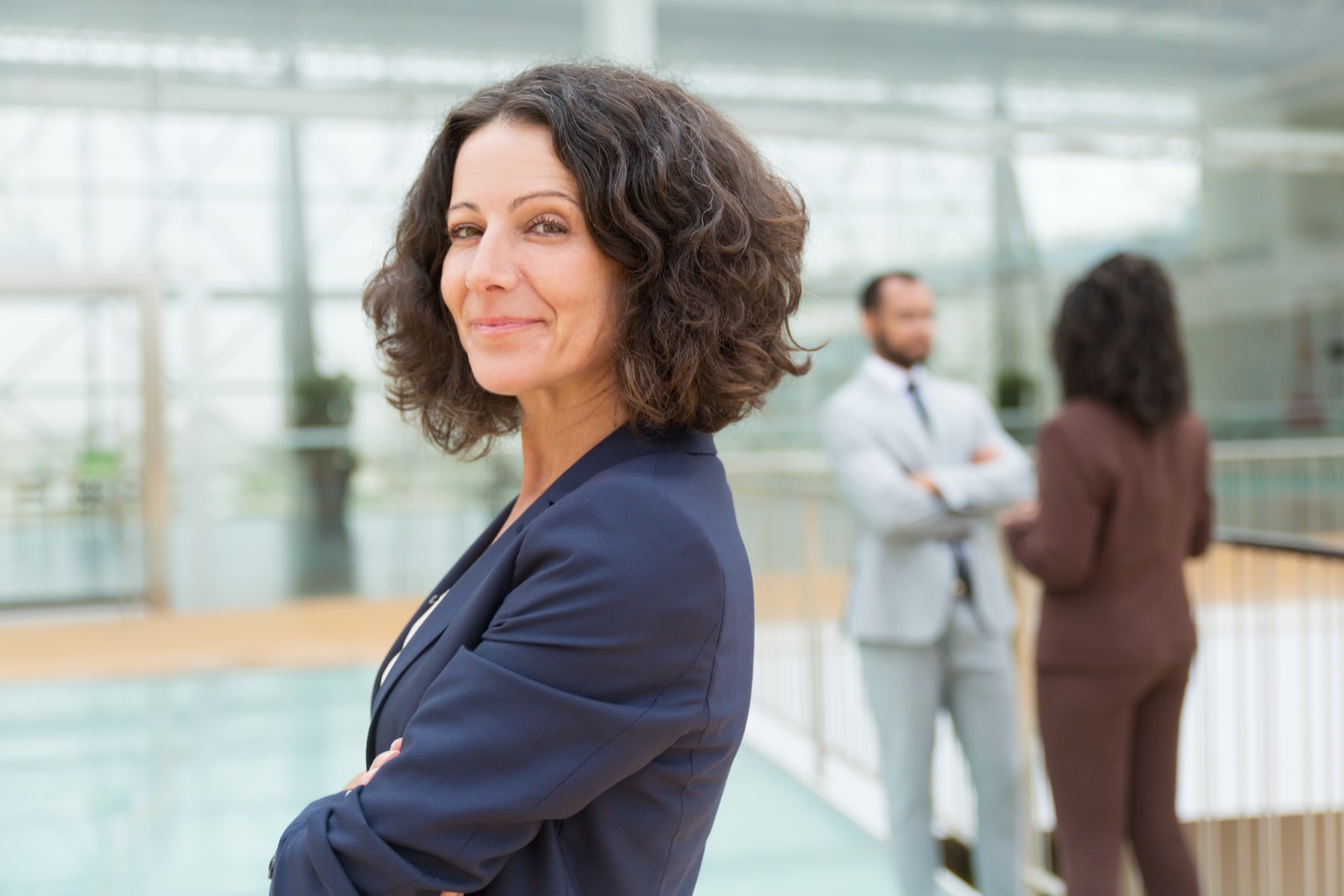 Confident HR leader with arms crossed